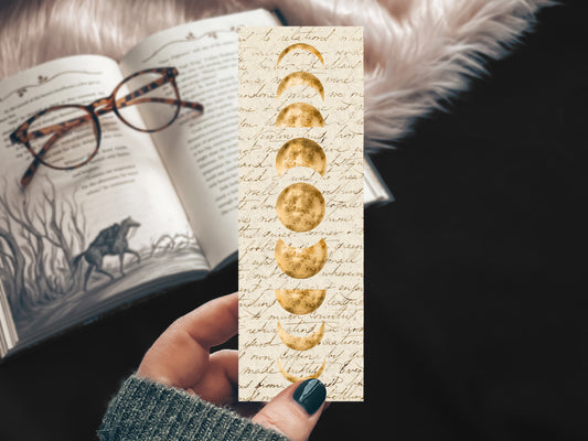 White bookmark with moon phases